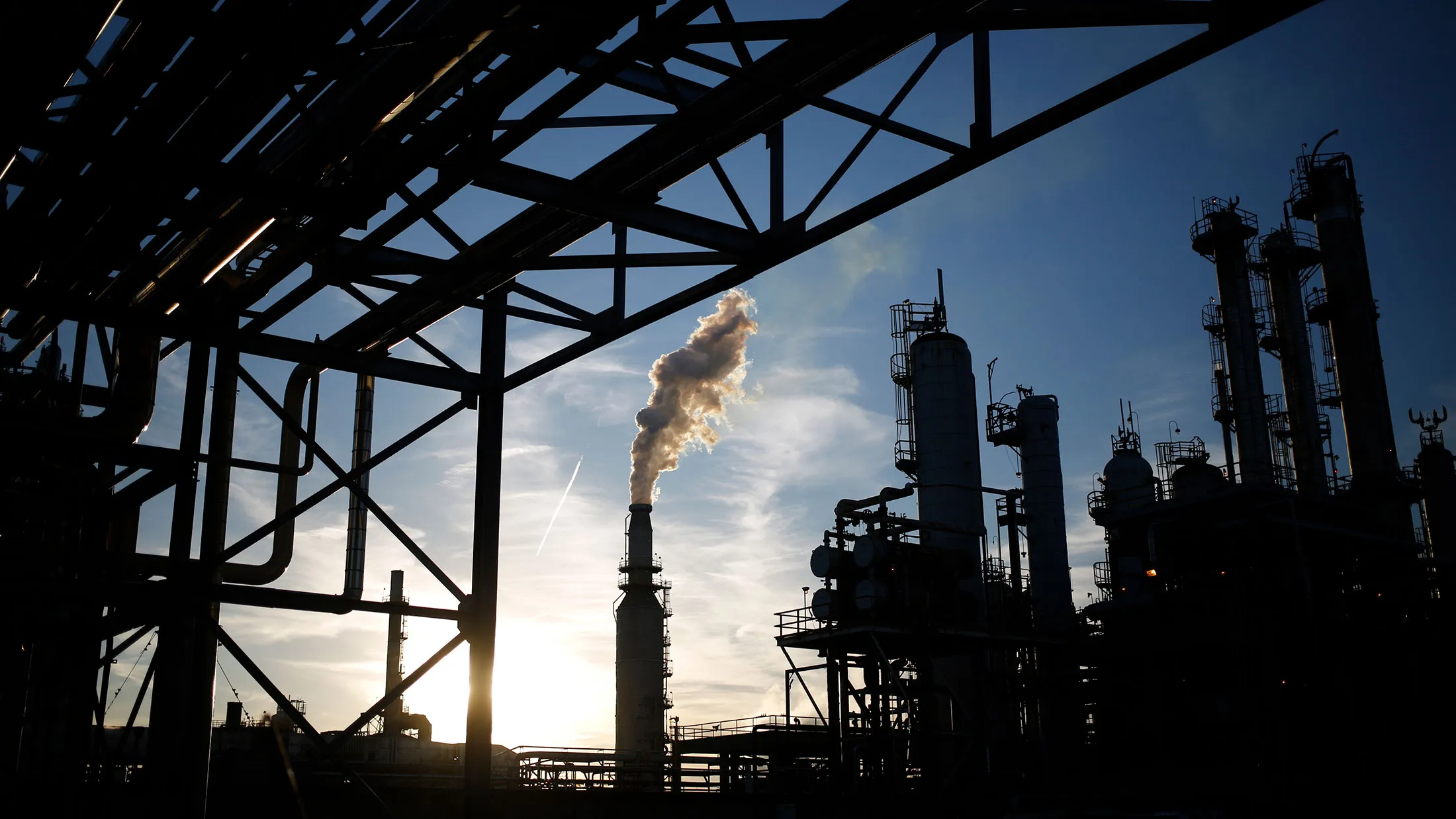 Emissions rise from a refining facility in Oregon, Ohio.
