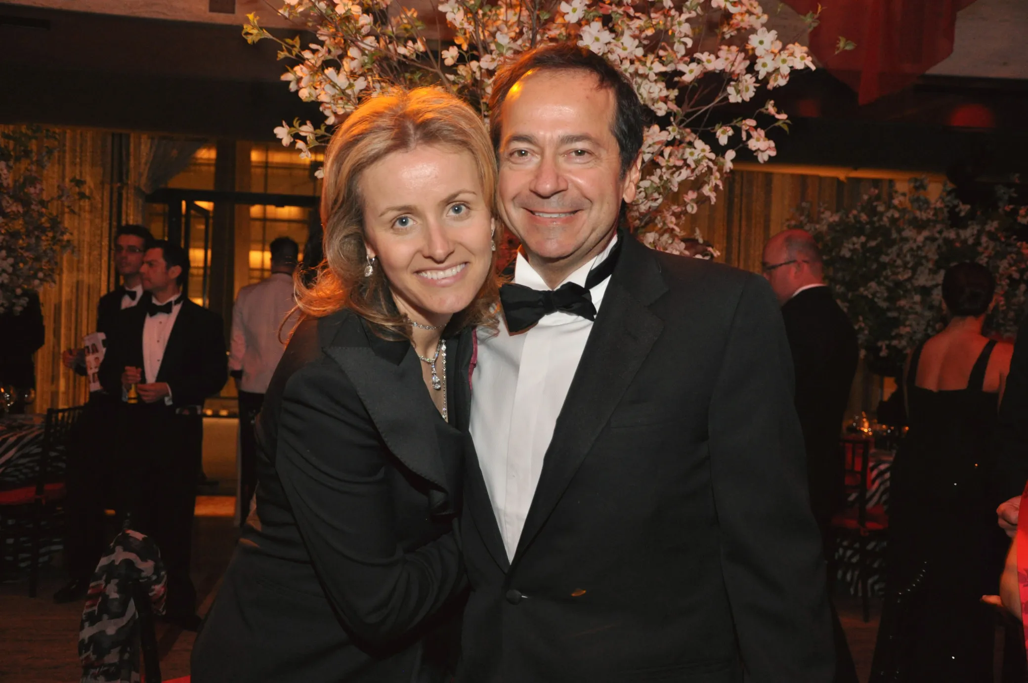 John Paulson and Jenny Paulson attend a benefit in New York in 2011.