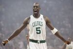 Boston Celtics' Kevin Garnett gestures to the crowd just before tipoff of Game 1 of an NBA Eastern Conference semifinal basketball series against the Cleveland Cavaliers in Boston, Tuesday, May 6, 2008. KG is set to add another chapter to his legacy when he becomes the 24th member of the Celtics organization to have his jersey number retired. (AP Photo/Winslow Townson, File)