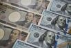 Japanese and US Banknotes Amid Pressure on Yen 