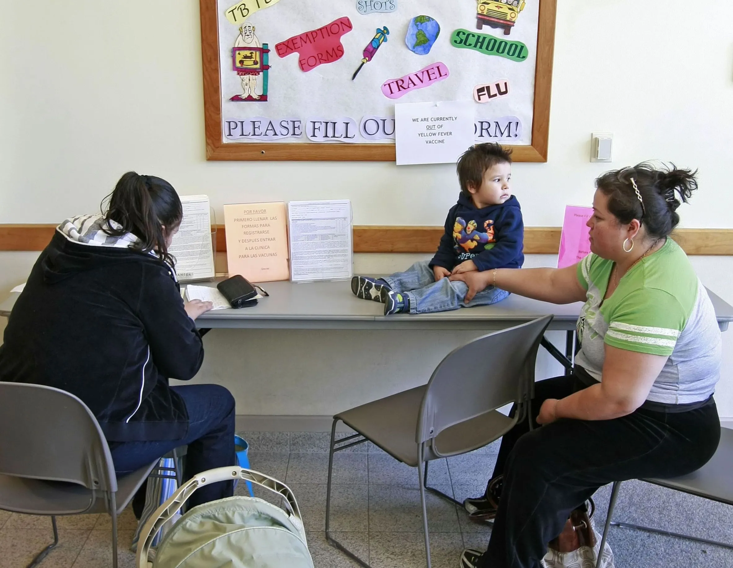 Families await their flu shots in Provo, Utah. A new study finds that U.S. data is ill-equipped to track potential flu outbreaks among low-income populations, who also have lower rates of immunization.&nbsp;