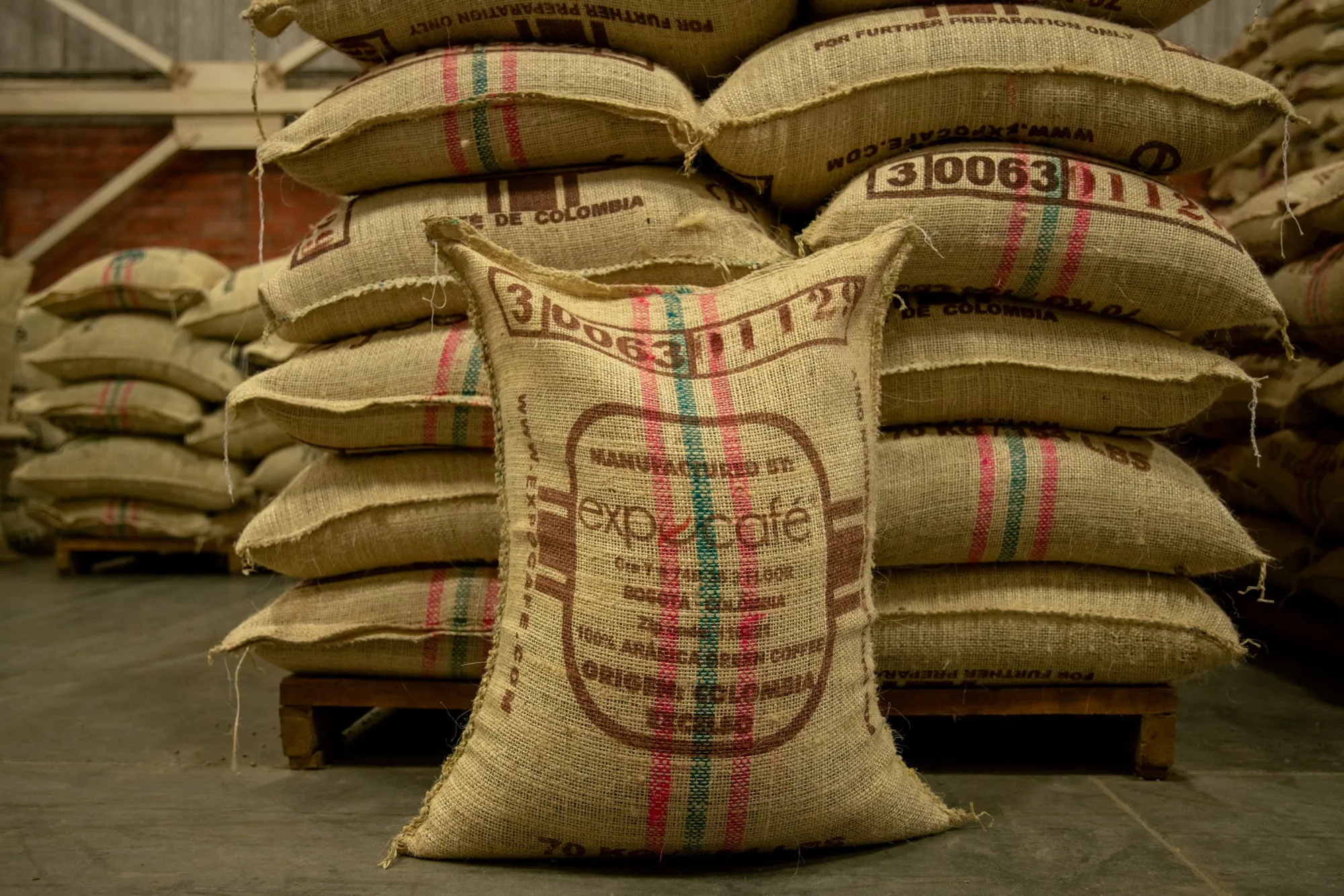 Arabica coffee bags at a threshing plant in Tulua, Colombia