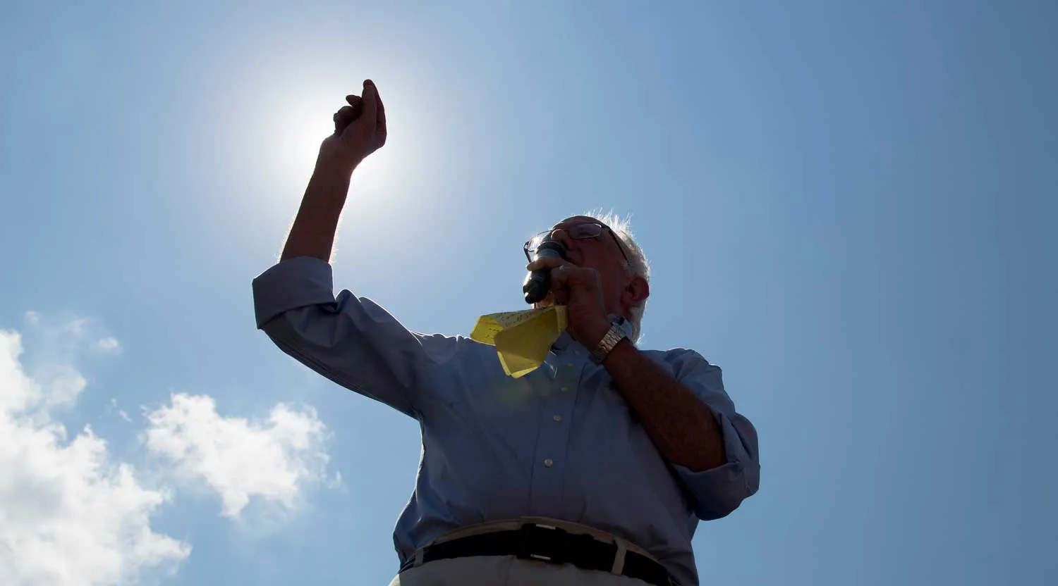 Senator Bernie Sanders, an independent from Vermont and 2016 Democratic presidential candidate, speaks to attendees at the Iowa State Fair Soapbox in Des Moines, Iowa, U.S., on Saturday, Aug. 15, 2015. The Iowa State Fair is expected to host 18 presidential candidates and runs until Aug. 23. Photographer: Andrew Harrer/Bloomberg *** Local Caption *** Bernie Sanders

