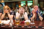  New England Patriots fans react to a Seattle Seahawks touchdown during the second quarter in Super Bowl XLIX at Jerry Remy's Sports Bar in Boston, Mass. on Feb. 1, 2015.
