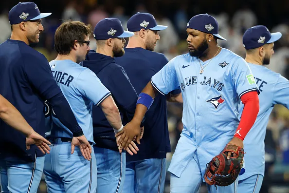 Vladimir Guerrero Jr., left, with Toronto Blue Jays teammates after their win over the Los Angeles Dodgers.