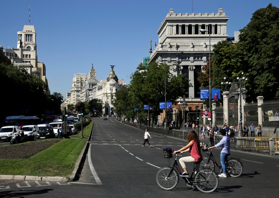 Cyclists look at Alcala Street, which was free of cars as part of European Mobility Week in central Madrid.