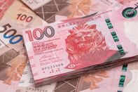 Hong Kong Dollar, Chinese Yuan and US Dollar Banknotes As Currency Peg Intervention From HKMA Continues Into Third Day