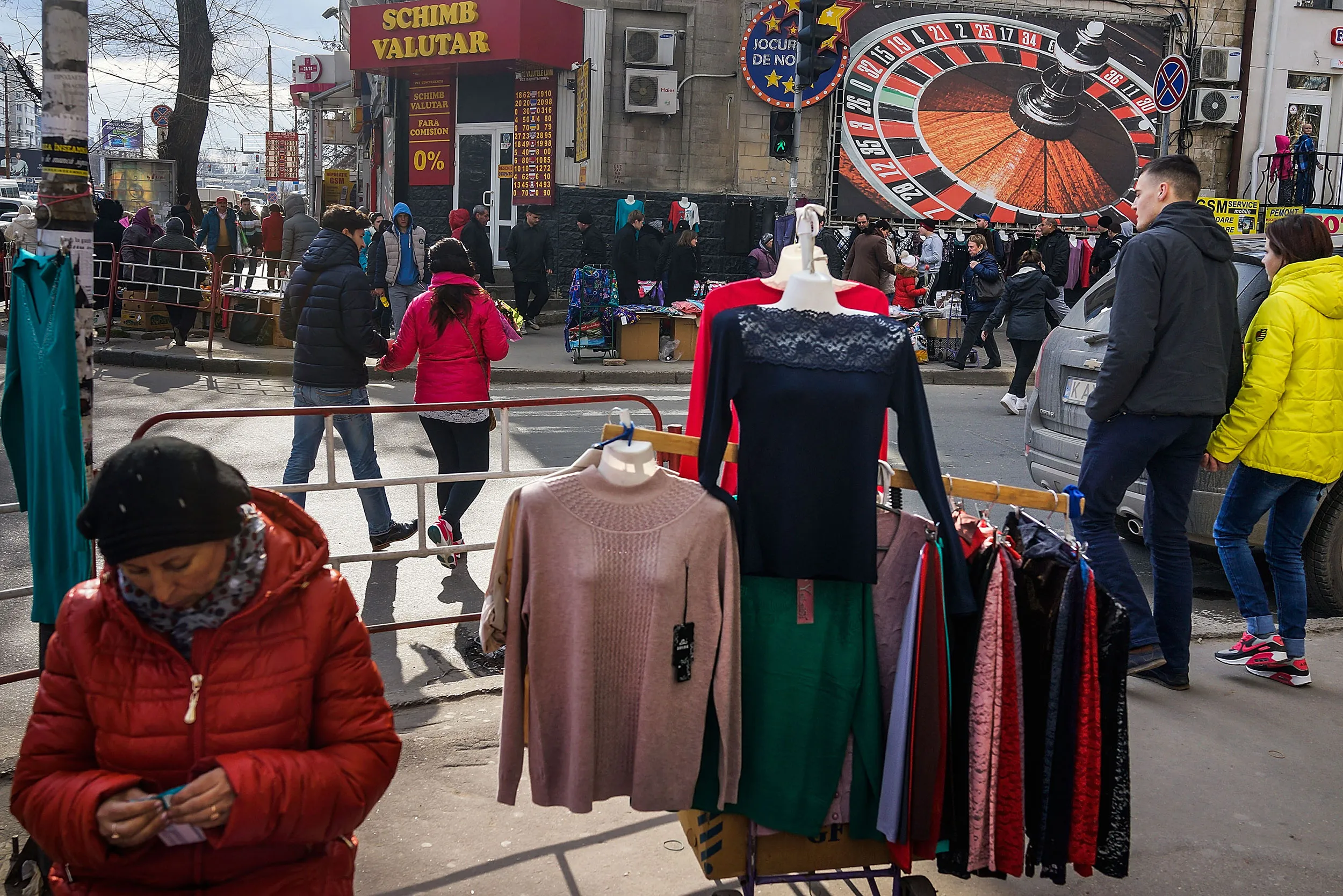 A woman offers clothes on the street on March 8, 2015 in Chisinau, Moldova.
