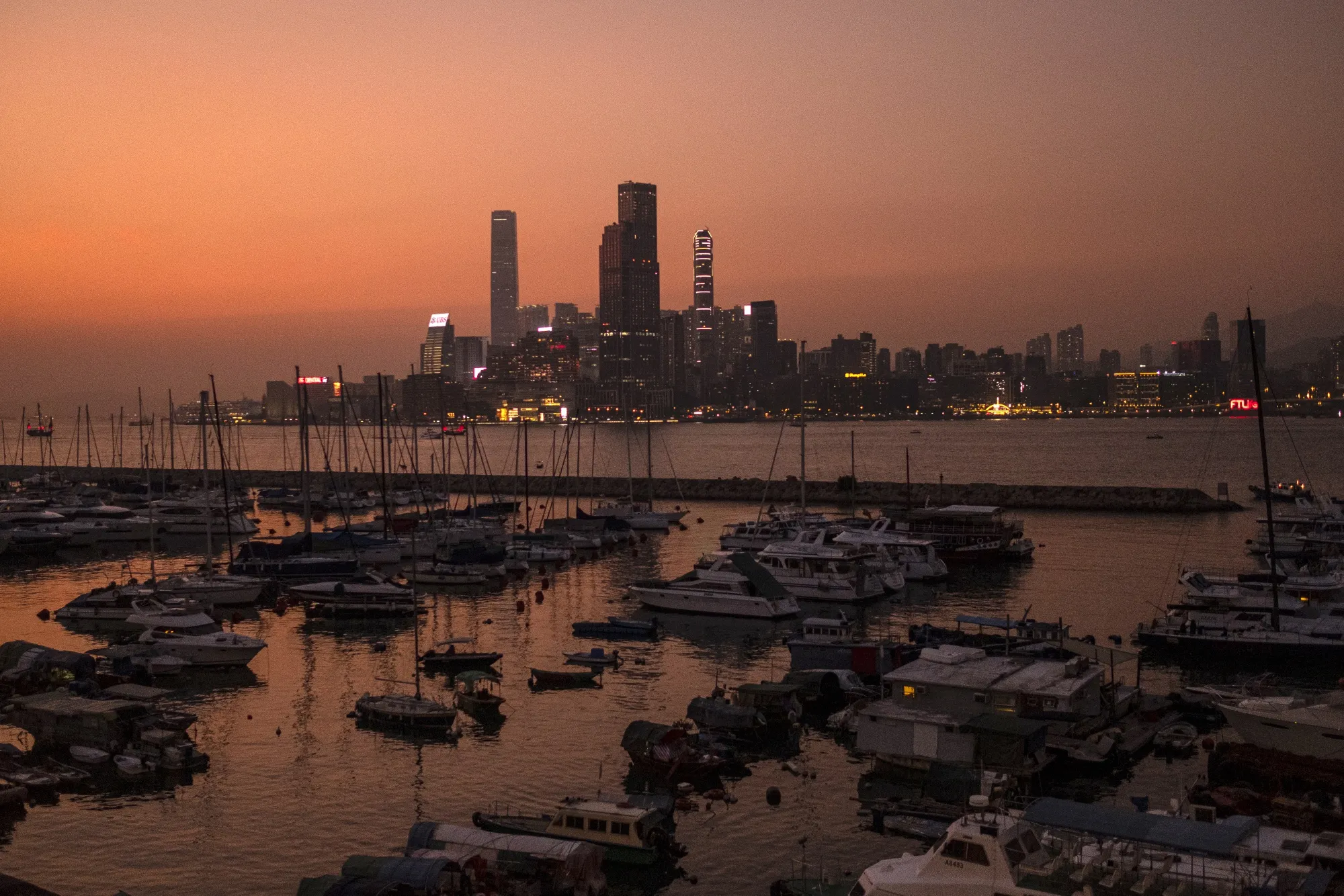 Buildings in Kowloon are seen across the Victoria Harbor in Hong Kong.