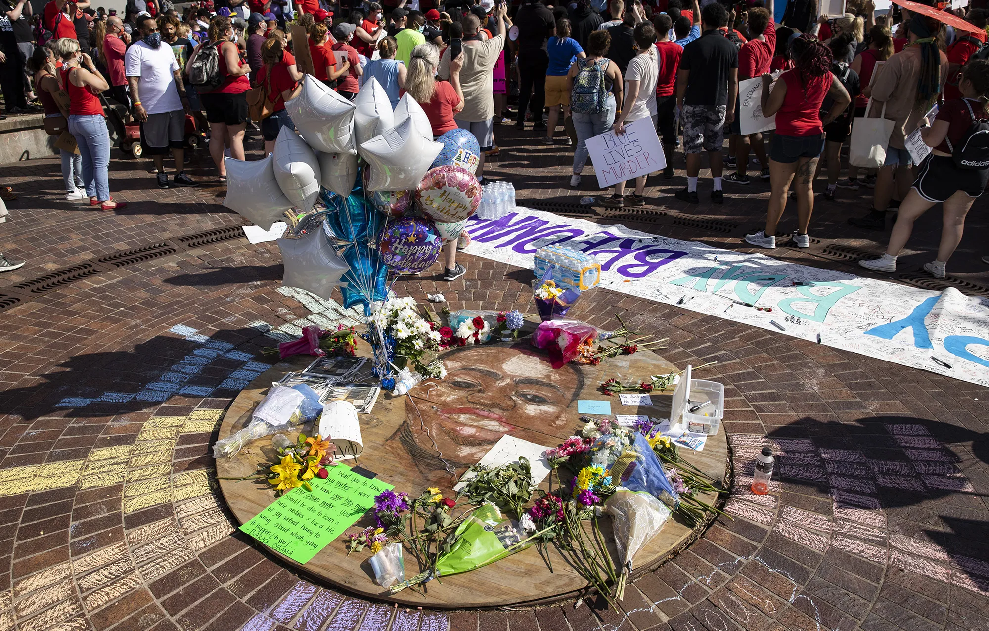 Protesters gather around a memorial for Breonna Taylor, on what would have been her 27th birthday, in Louisville, Kentucky&nbsp;on June 5.
