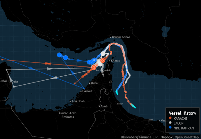 Ships leave Hormuz near Iran's coastline.