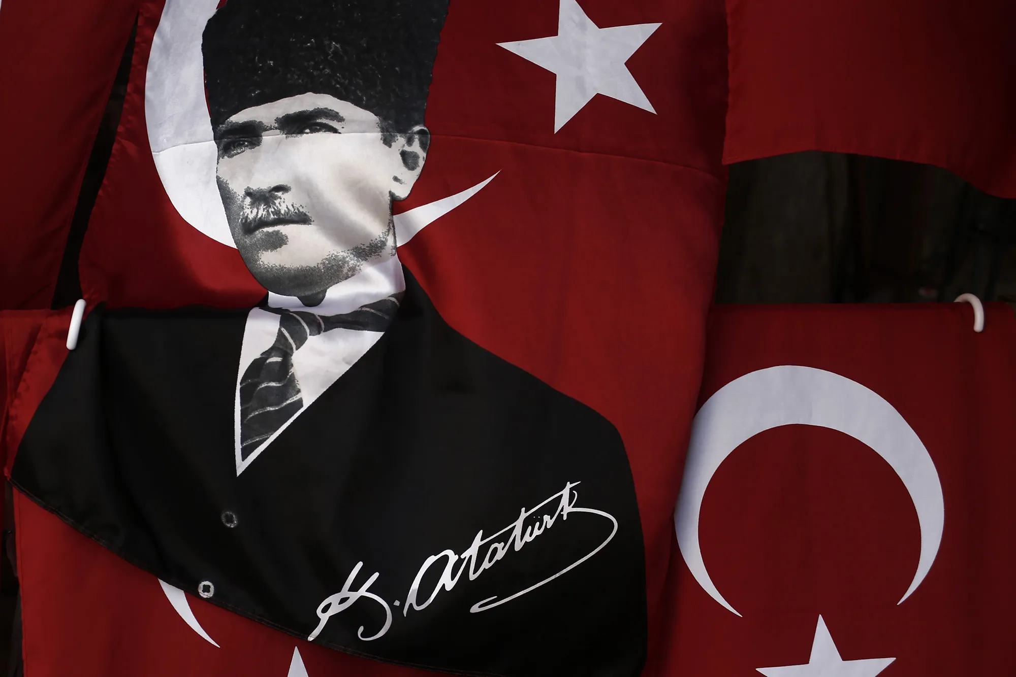 Turkish flags decorated with the image of Kemal Ataturk.