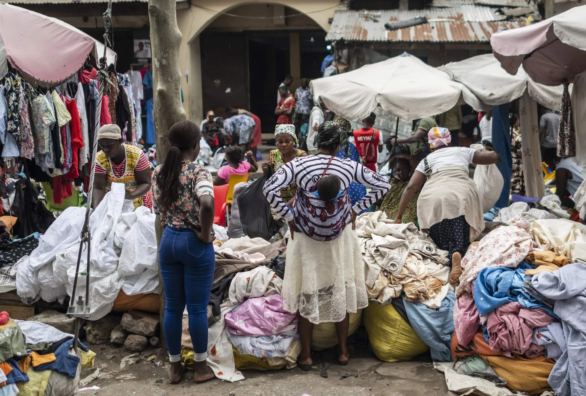 Vendors wait for customers at the Kantamanto textile market in Accra, Ghana.
