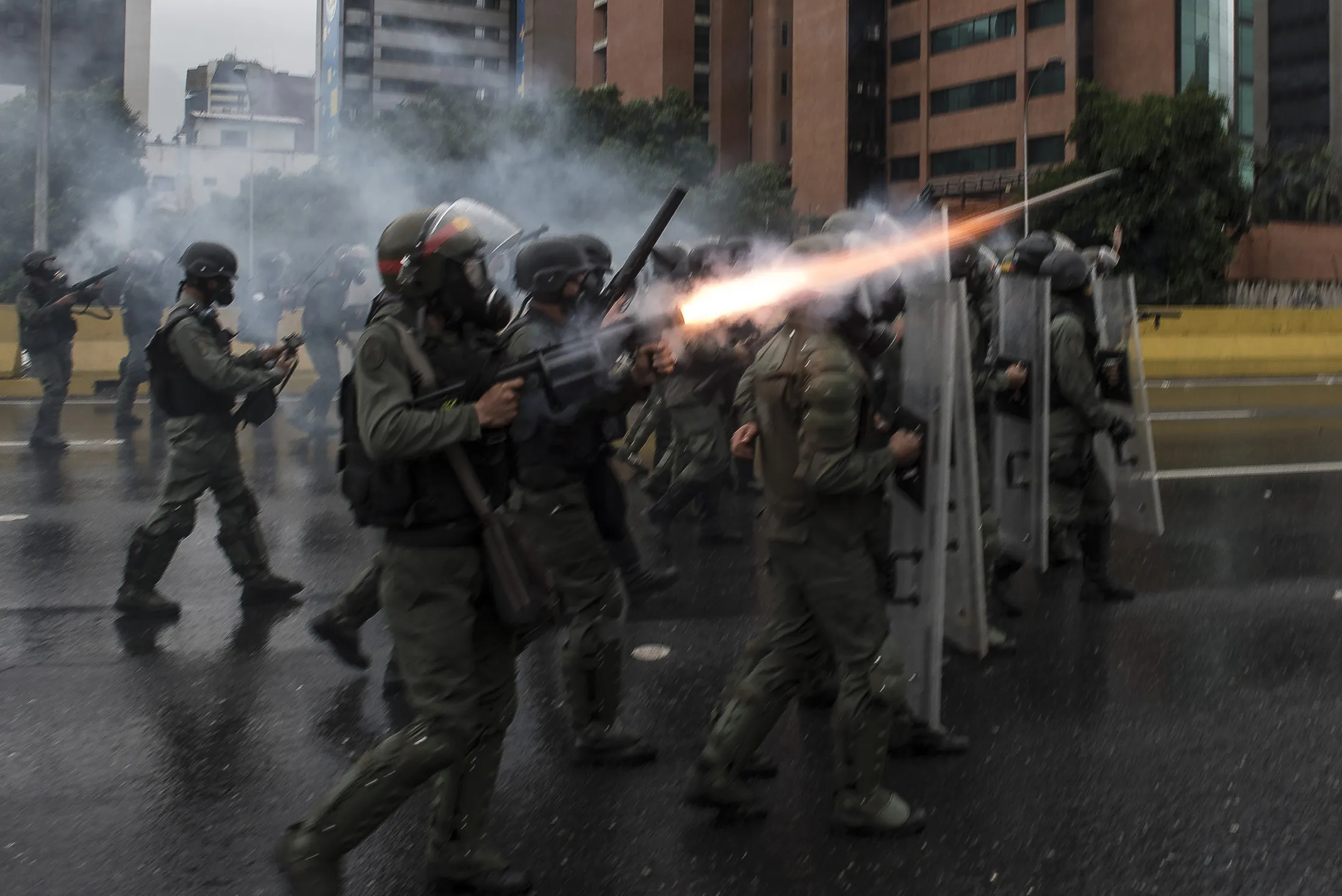 National Guard officers fire tear gas during a protest against Venezuelan President Nicolas Maduro in Caracas, Venezuela, on Thursday, April 13, 2017. During the economic crisis and the latest protests, which are coinciding with Holy Week, the Catholic Church has regained its critical voice. Although the Vatican mediated the political dialog in late 2016, the Venezuelan Episcopal Conference maintained its outspoken criticism of the government and its management of the process that ended without results.
