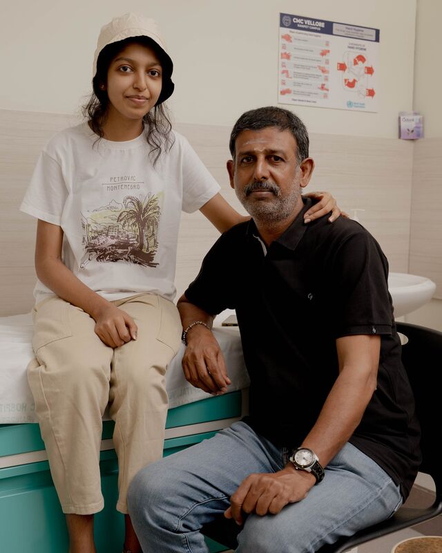 Lymphoma patient Pg Shrinidhi and her father S Prabhakaran sit inside a doctors office. Shrinidhi recently turned 17.