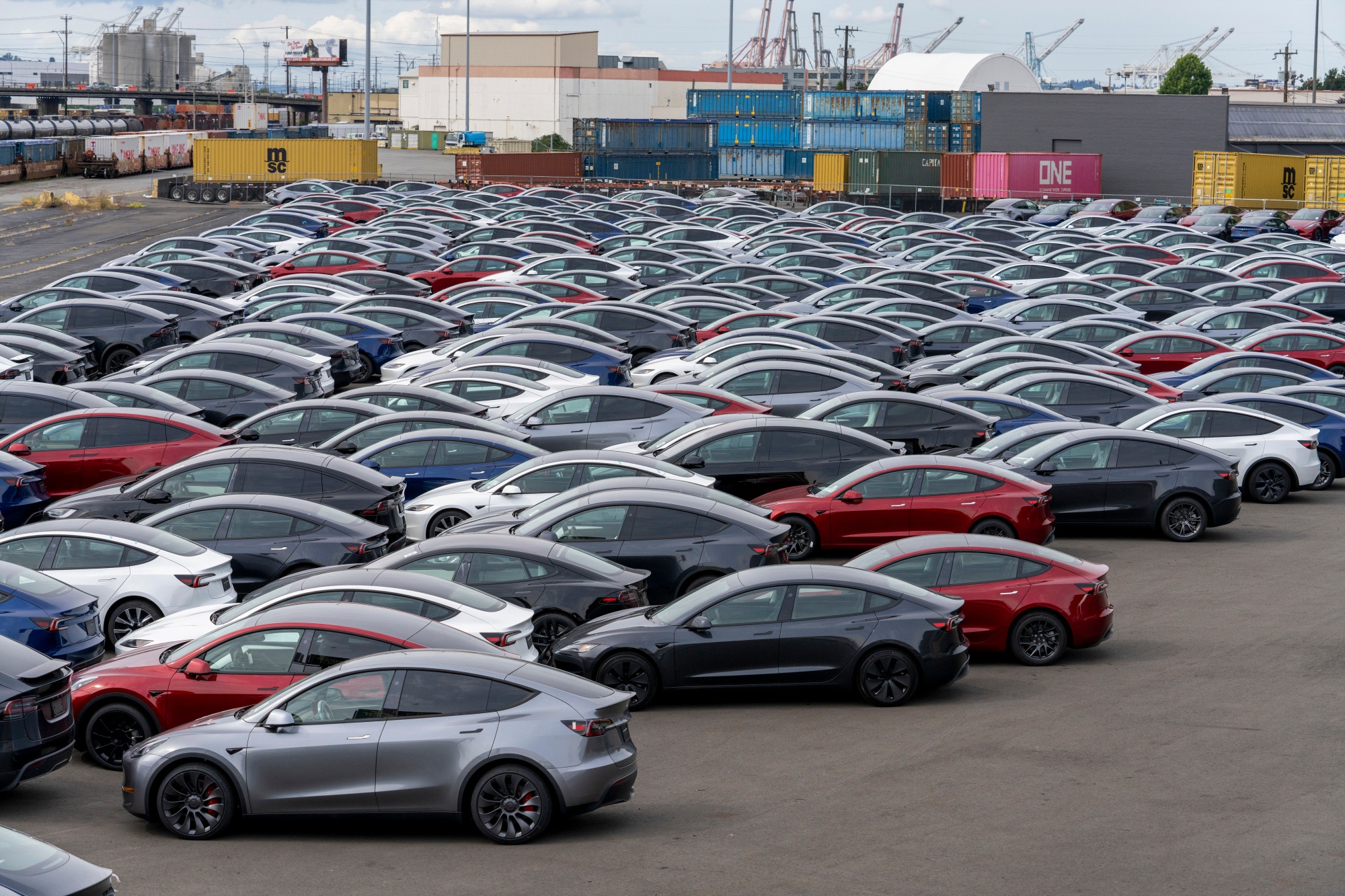 New Tesla Vehicles At A Logistics Drop Zone In Seattle