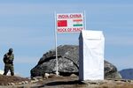 Indian Army personnel keep vigilance at Bumla pass at the India-China border in Arunachal Pradesh in 2012.