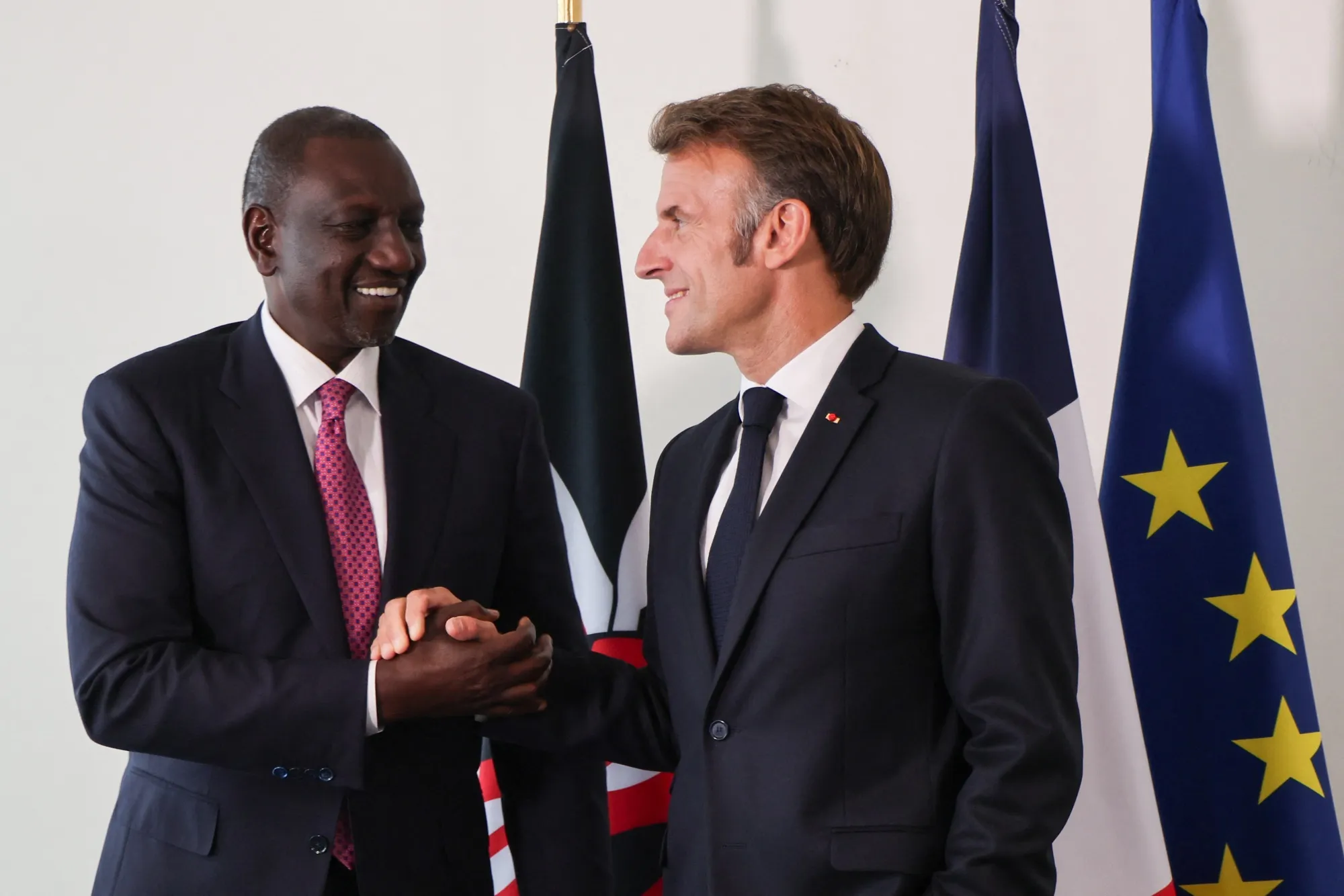 Emmanuel Macron with&nbsp;William Ruto.