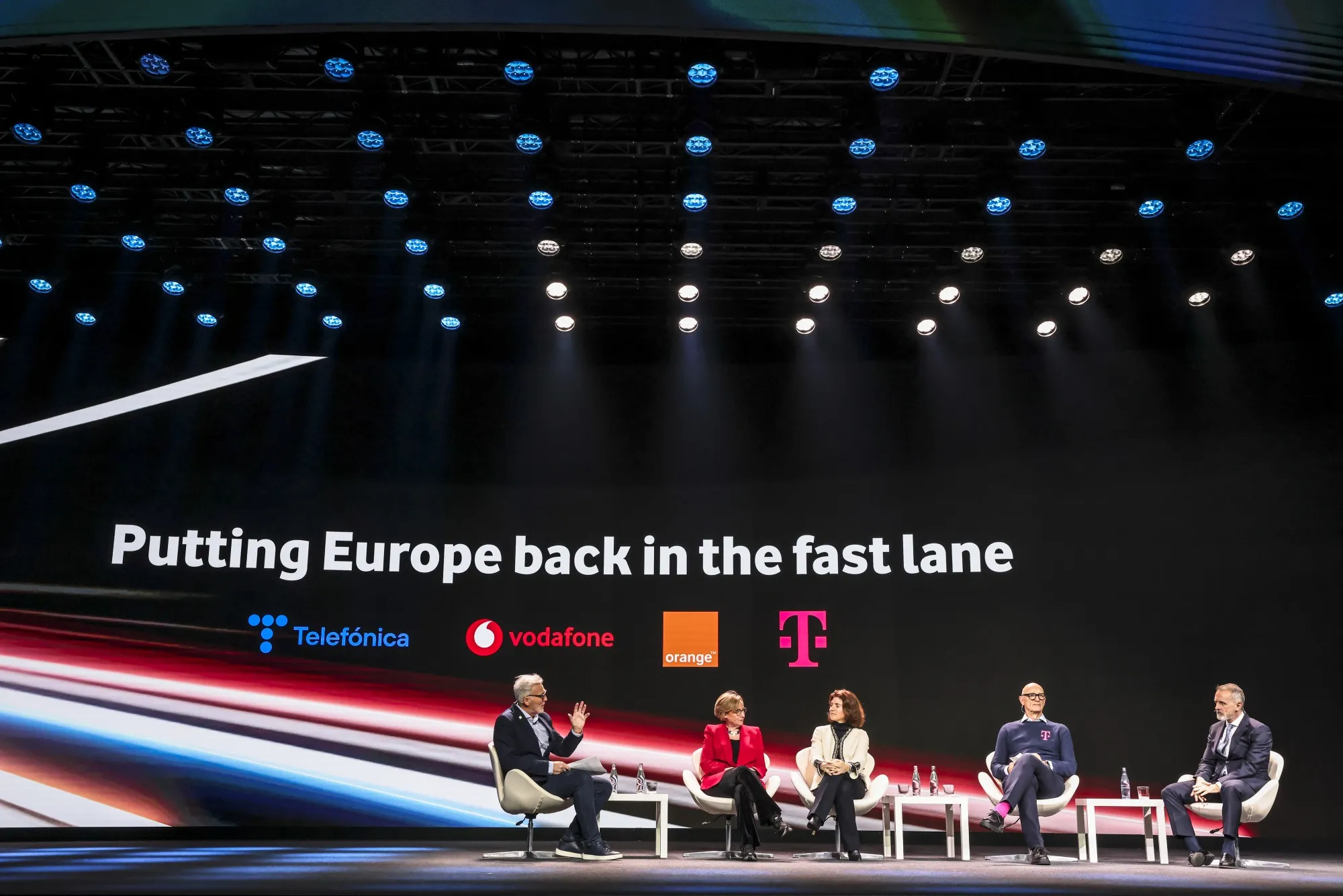 Shaun Collins, from left, Margherita Della Valle, Christel Heydemann, Tim Hoettges,&nbsp;and Marc Mutra&nbsp;during a panel session at the MWC25 tech show in Barcelona, Spain, on March 3.