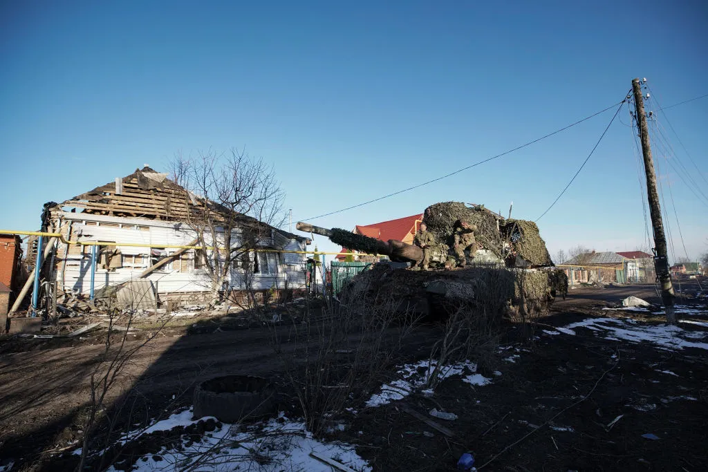 Russian soldiers ride atop a military vehicle&nbsp;in the Sudzha district of the Kursk region&nbsp;on March 18.