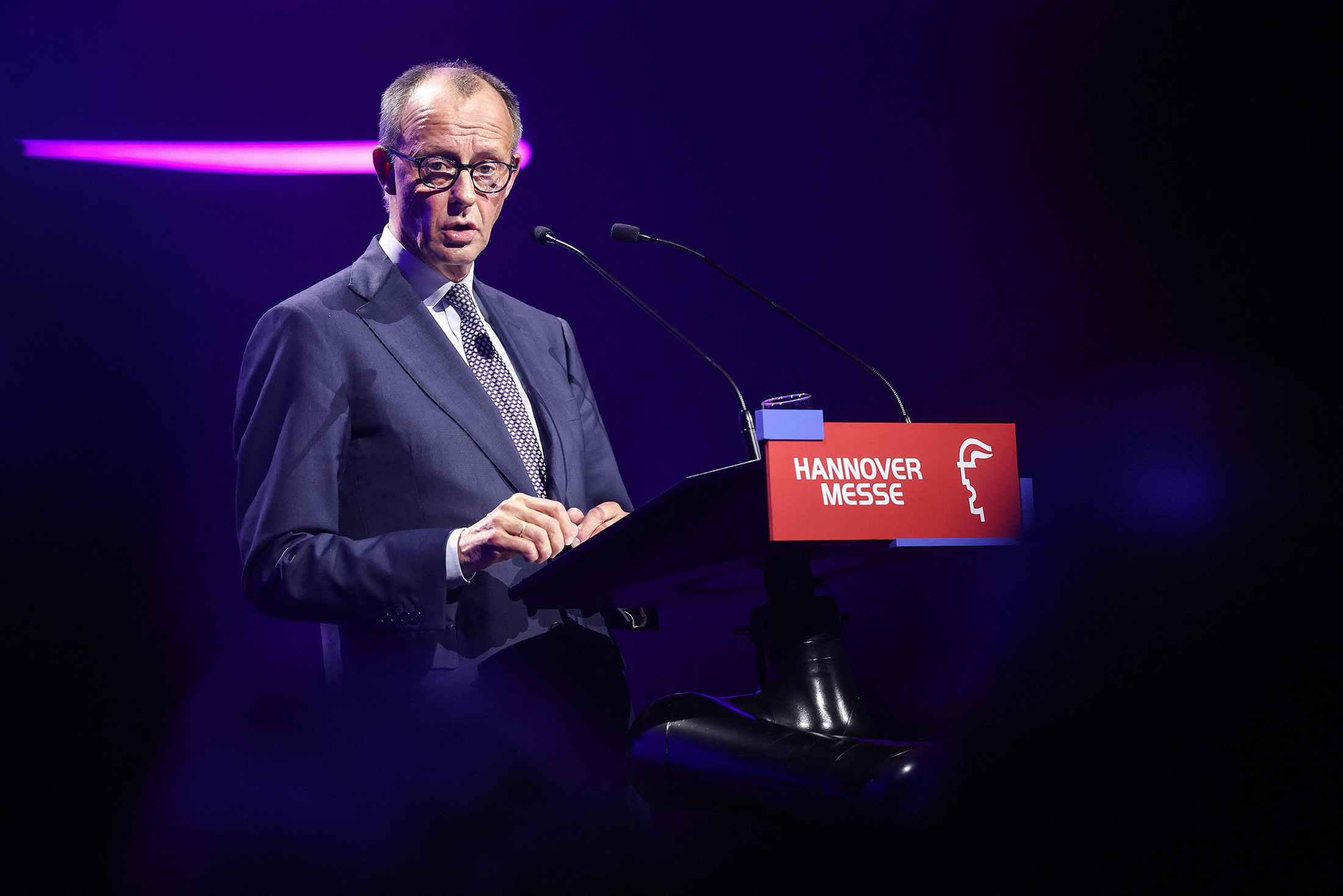 German Chancellor Friedrich Merz delivers a speech during the opening gala of the Hanover industrial trade fair for mechanical and electrical engineering and digital industries, in Hanover, northern Germany on April 19, 2026. Photographer: Ronny Hartmann/AFP/Getty Images