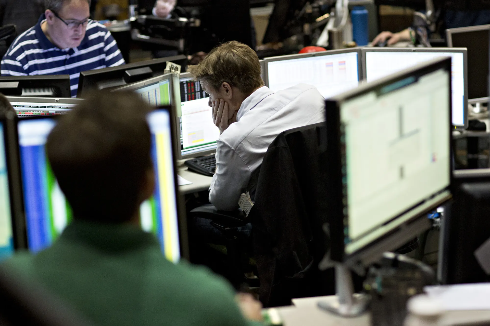 Traders work in the Cboe Volatility Index pit on the floor of the Cboe Global Markets Inc. building in Chicago, Illinois.