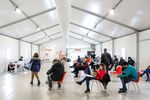 Visitors wait in an observation room at a Covid-19 vaccination center outside Rome's Termini railway station on Dec. 3.