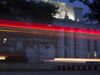 The Marriner S. Eccles Federal Reserve building stands past passing vehicles in this photograph taken with a tilt-shift lens in Washington, D.C.