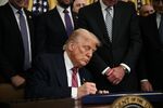 US President Donald Trump signs first-of-its-kind stablecoin legislation in July.
