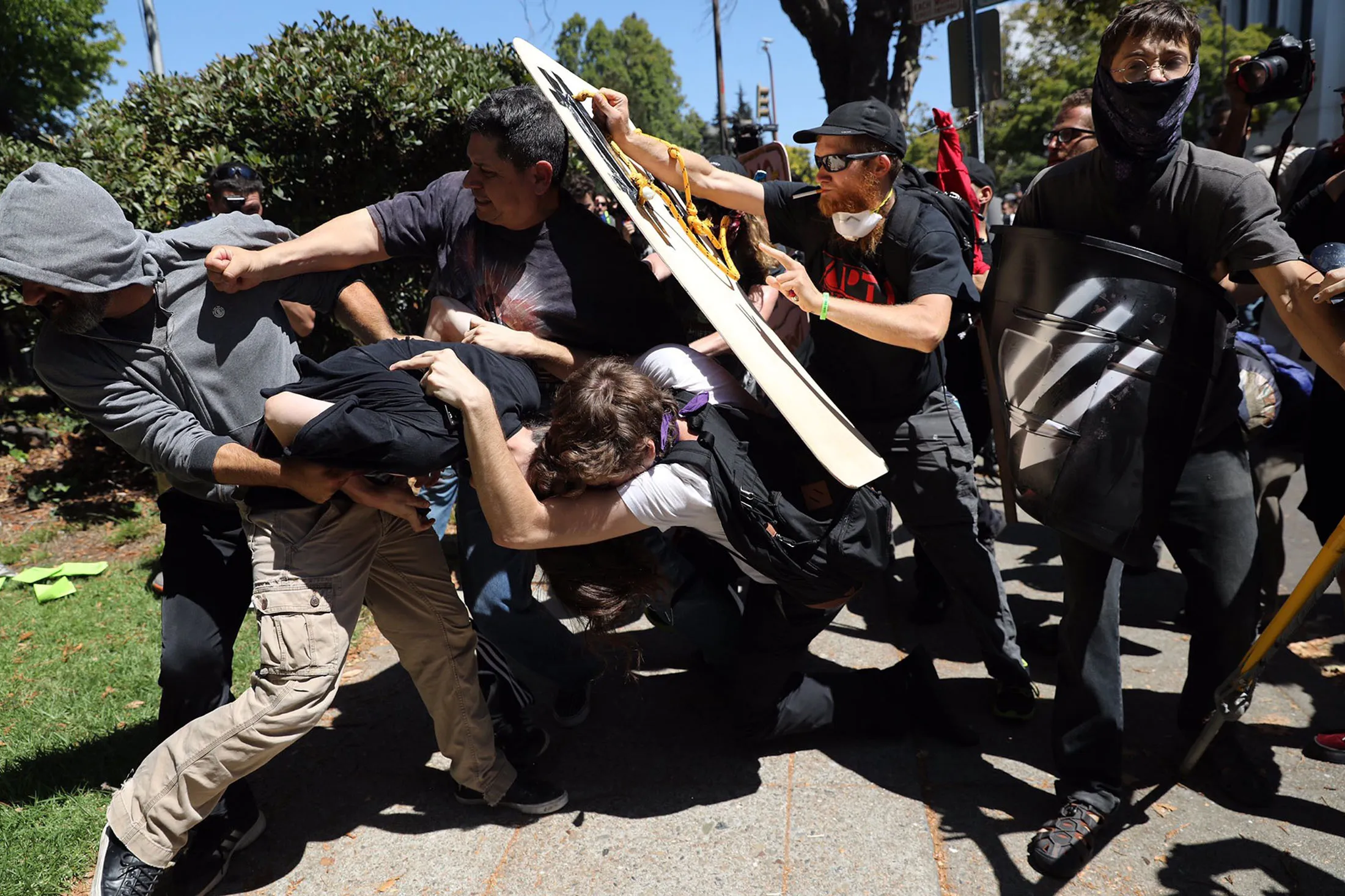 Fighting breaks out at Martin Luther King Park in Berkeley during demonstrations on Aug. 27, 2017.
