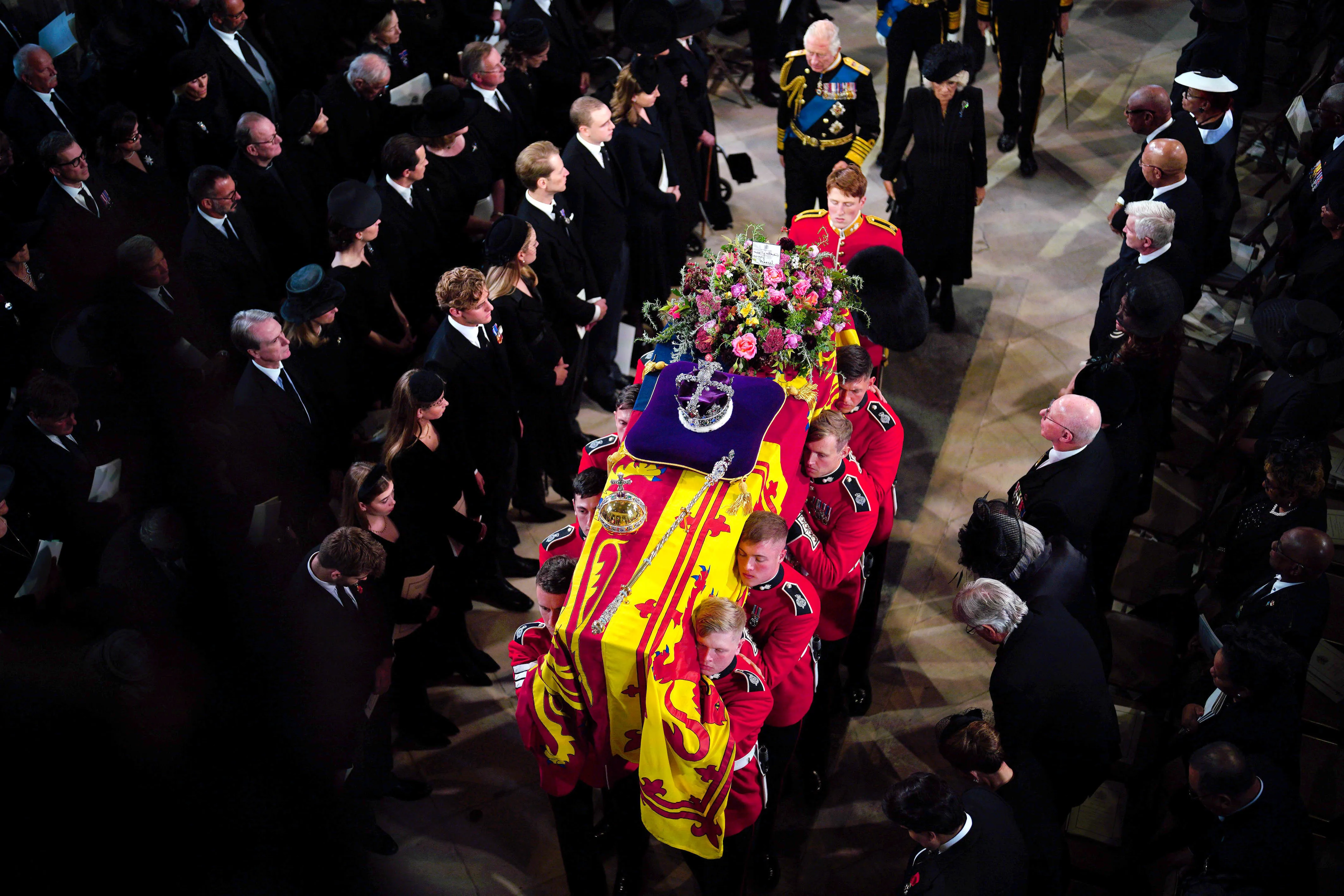 The coffin of Queen Elizabeth II is carried into St George's Chapel in Windsor, England.