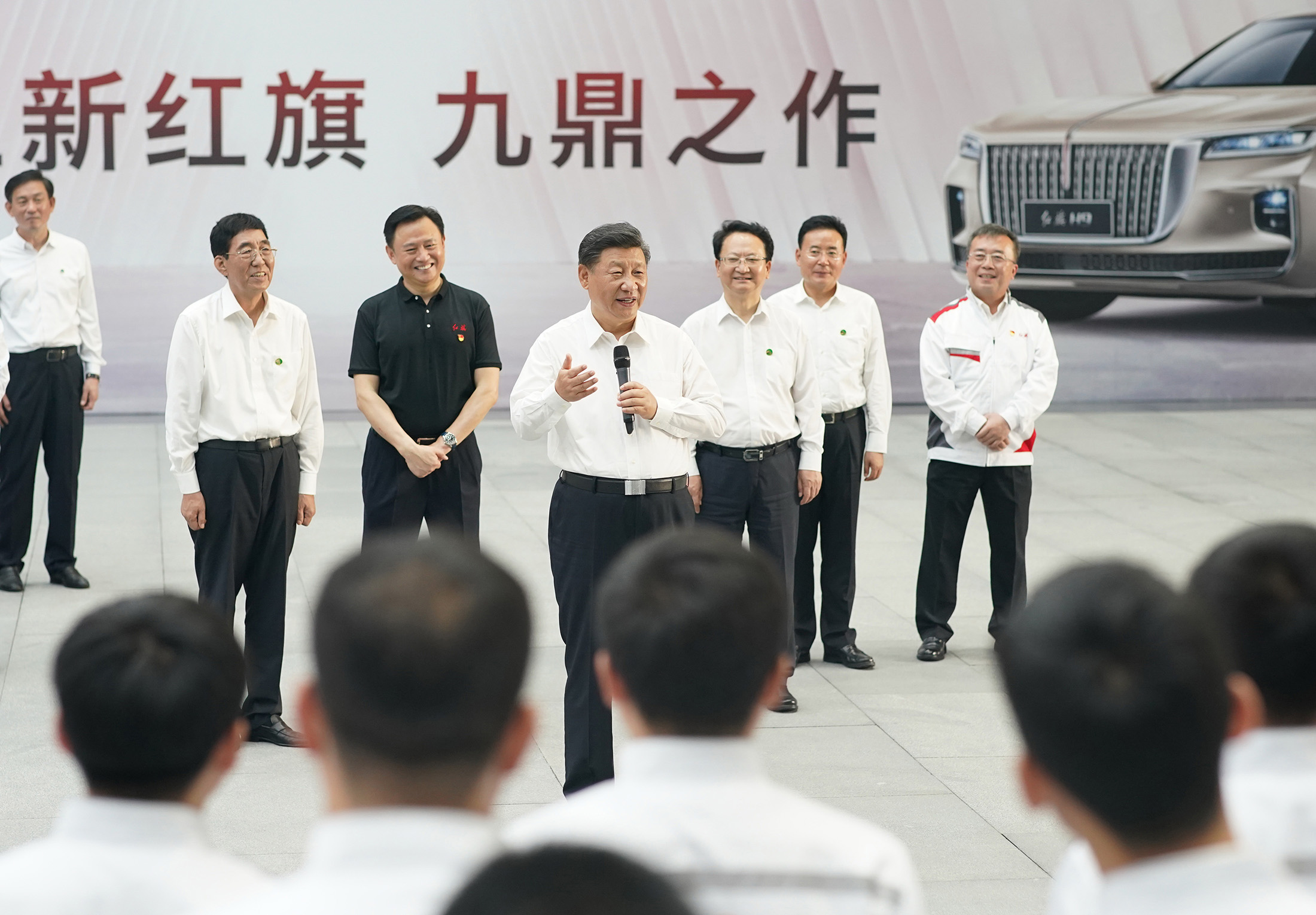 Xi Jinping, center, at the R&D headquarters of FAW Group in Changchun on July 23.