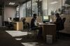 A worker speaks with a customer at a service center in the central business district (CBD) of Johannesburg, July 28.