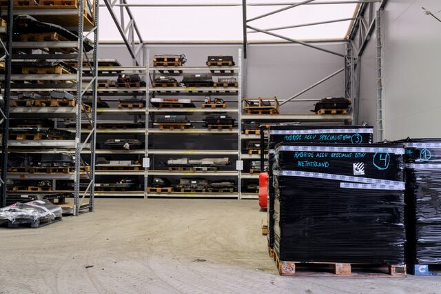 A warehouse at the Gronvolds Bil-Demontering facility holds about 280 used battery packs.