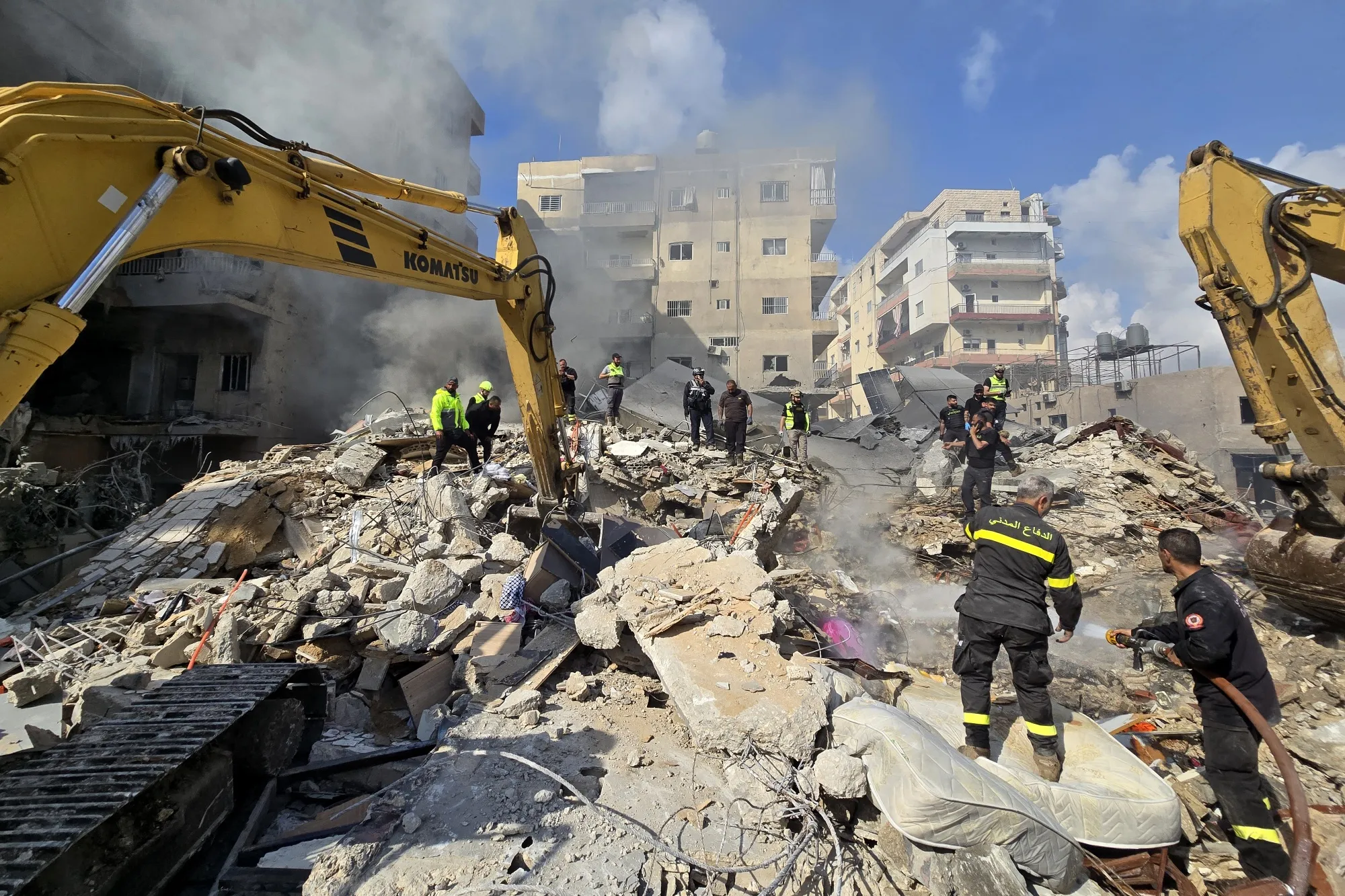 First responders rush to the site of an airstrike in Tyre, Lebanon on April 8.