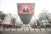 A screen displays a news broadcast of Chinese President&nbsp;Xi Jinping during the opening of the National People’s Congress in Beijing on March 5.