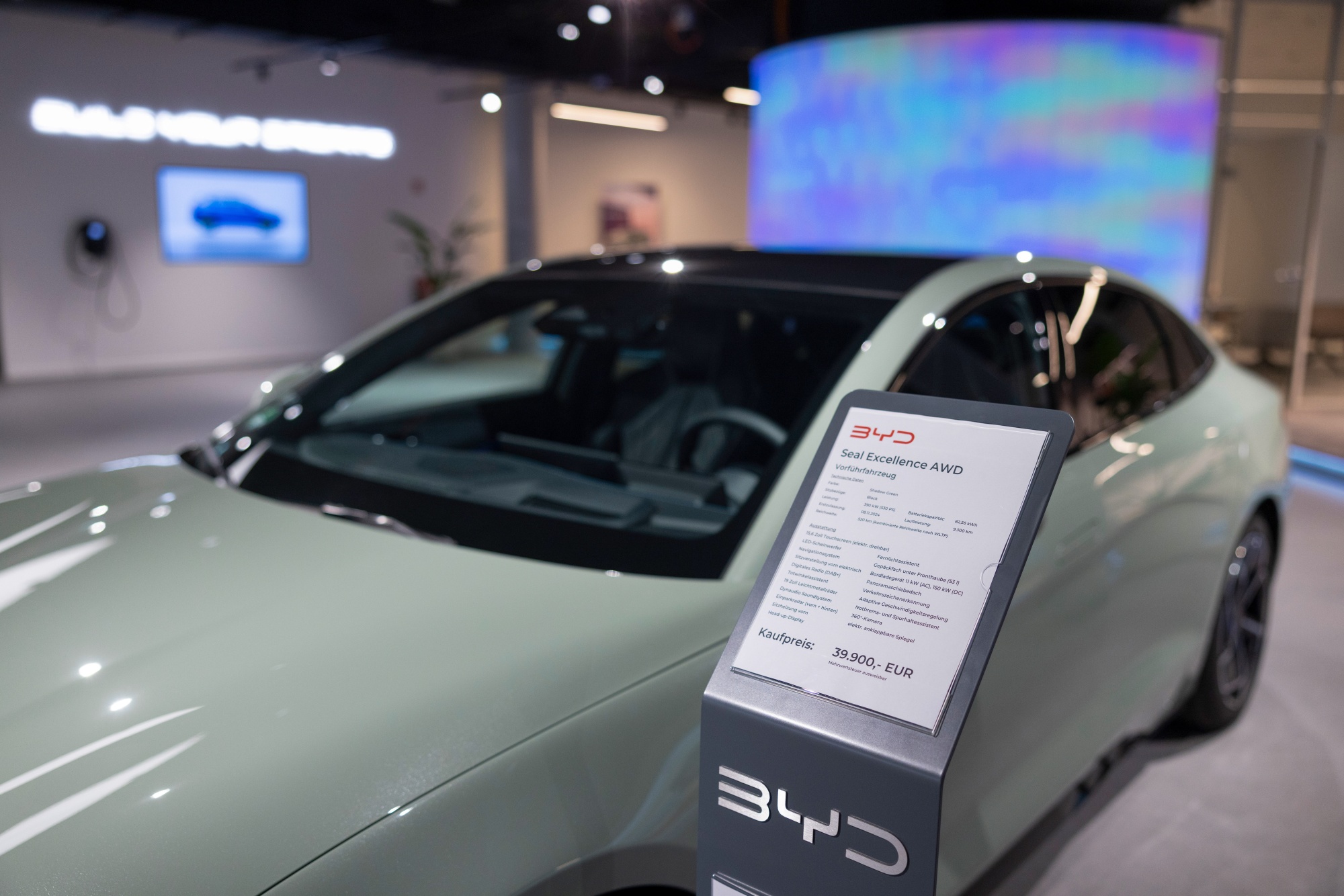 Pricing information near a BYD Seal electric vehicle at a BYD Co. dealership in Berlin, Germany, on Friday, Sept. 12, 2025. BYD is reinforcing its European expansion with new models and showrooms amid a bruising price war at home in China. Photographer: Liesa Johannssen/Bloomberg