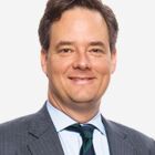 Headshot of Mark K Wiedman