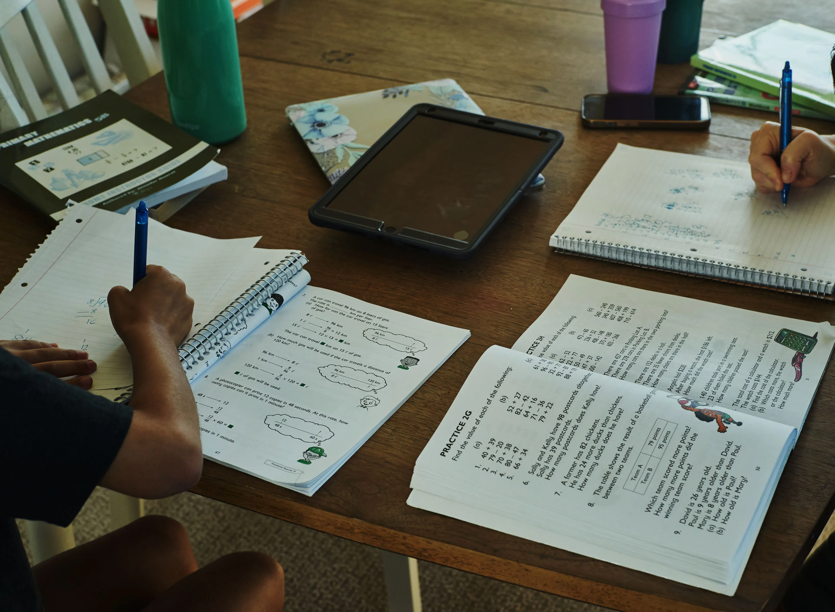 Two home-school students completing their work at home in Florida this fall.&nbsp;
