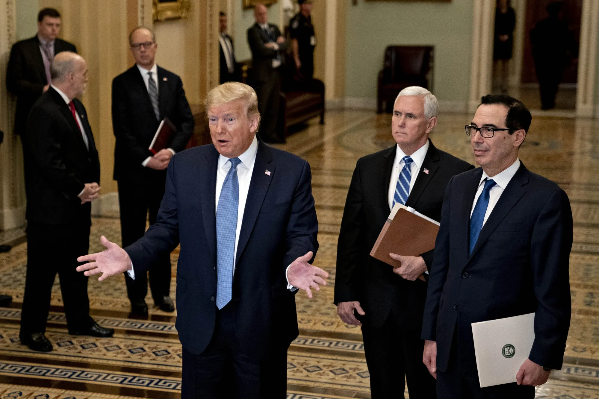Donald Trump, left, speaks&nbsp;after attending the weekly Senate Republicans policy luncheon at the U.S. Capitol in Washington, D.C. on March 10.