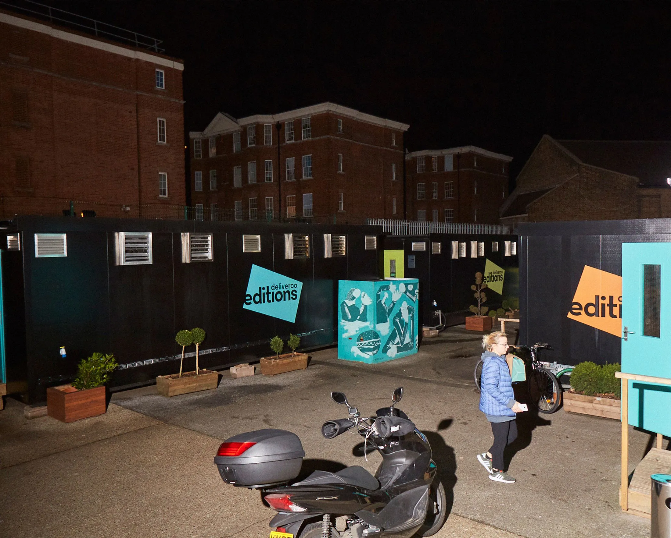 Deliveroo Editions, where shipping containers serve as kitchens, in London.