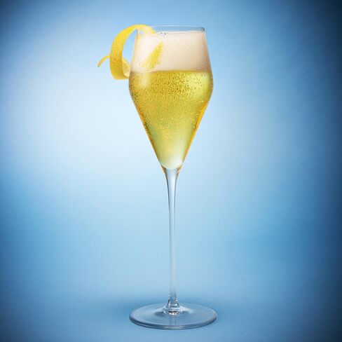 1468005261_perfect-champagne-cocktail-french-75-pursuits-bloomberg-lede