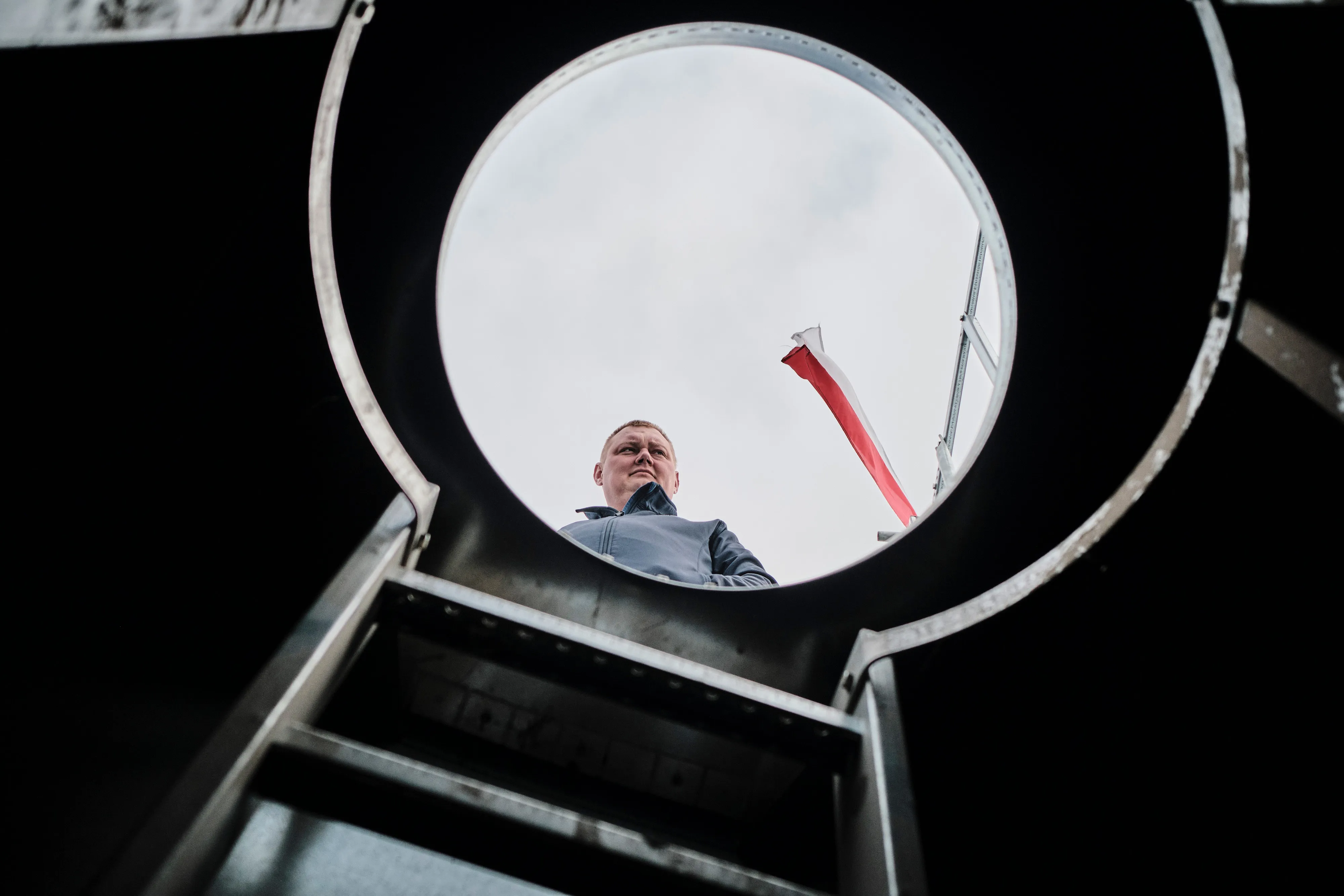 A farmer and union member inspects a silo storing unsold grain on a farm in Sedziejowo, Poland,&nbsp;April 17.&nbsp;