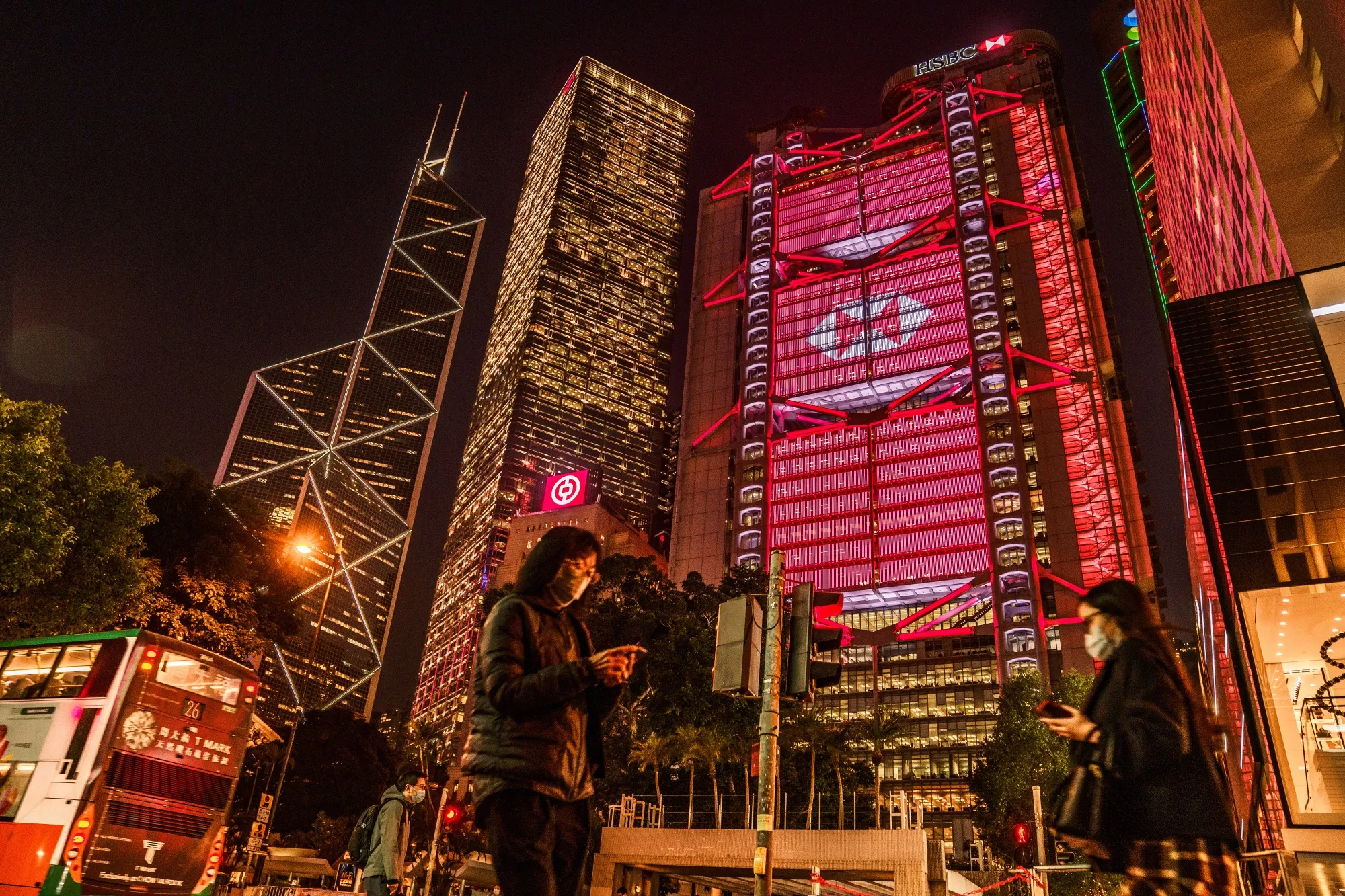 The HSBC Holdings Plc headquarters at night in Hong Kong.