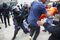 Civil Guard officers armed with batons clash with people outside a polling station in Sant Julia de Ramis.