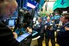 Traders work on the floor of the New York Stock Exchange (NYSE) in New York, U.S., on Monday, Oct. 29, 2018. U.S. stock rose on speculation the month long rout in equities had gone too far.