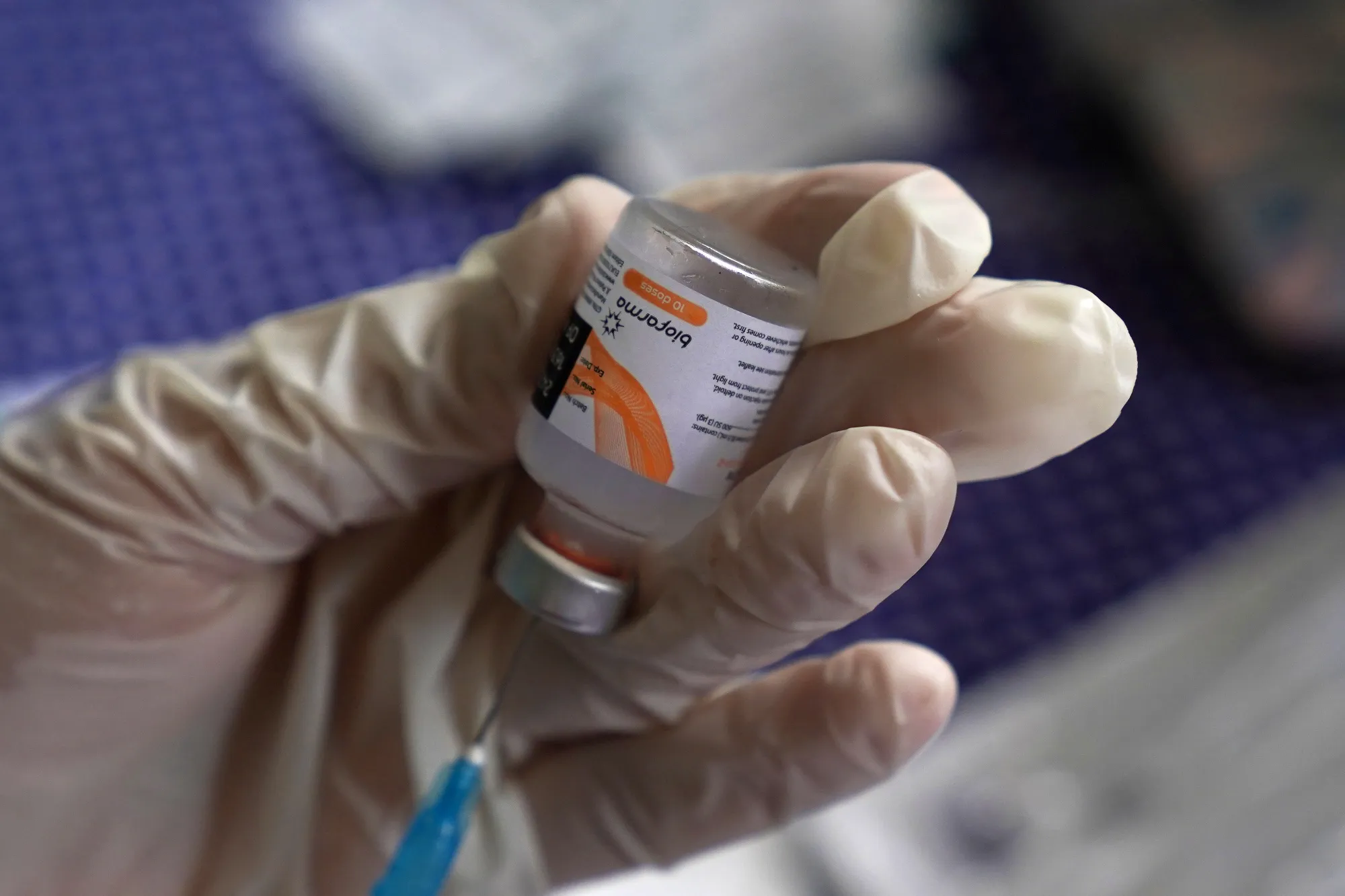 A healthcare worker prepares a dose of the Sinovac&nbsp;Covid-19 vaccine during a vaccination drive in Jakarta, Indonesia.