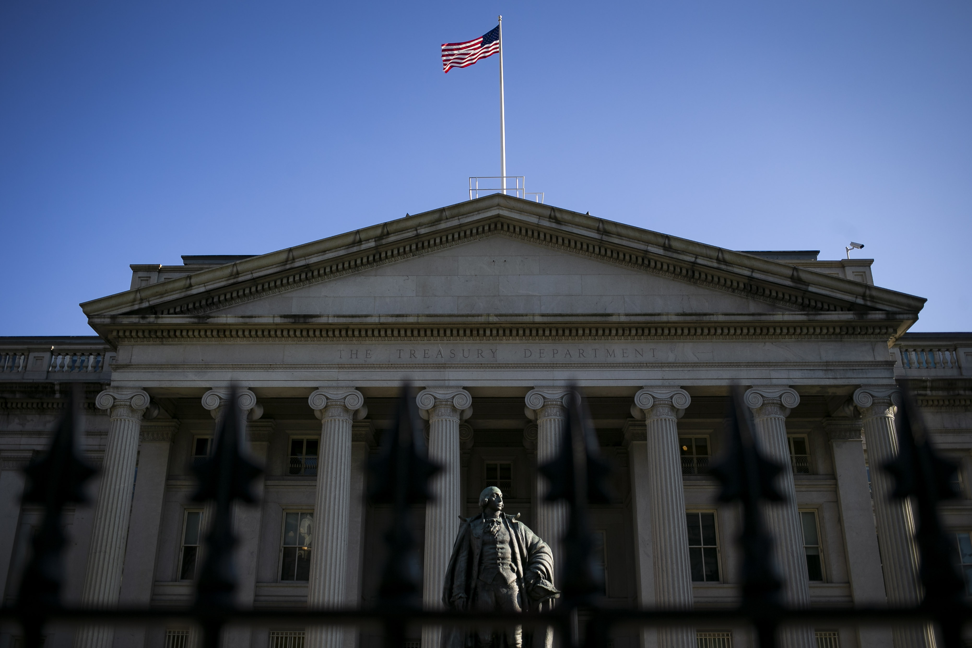 A statue of Albert Gallatin, former U.S. Treasury secretary, stands outside the Treasury building in Washington, D.C.