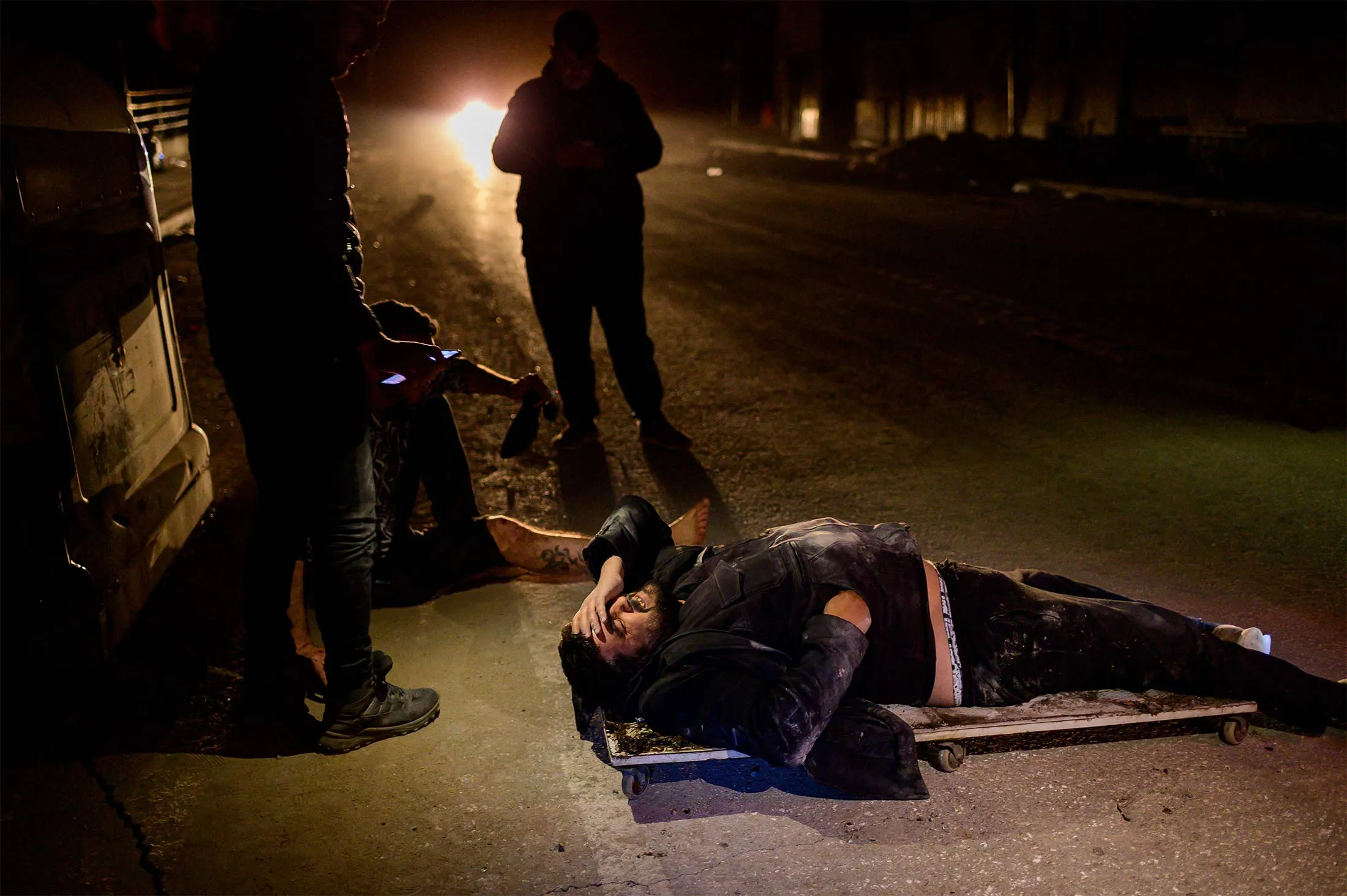 Injured people lie on the ground after an earthquake&nbsp;in Antakya,&nbsp;Hatay province, Turkey,&nbsp;on Feb. 20.
