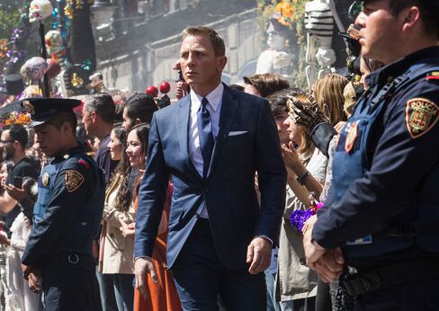 In Spectre, Bond wore his suits slightly longer than in Skyfall, Temime said.